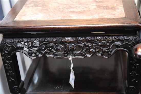 A Chinese hardwood three tier occasional table